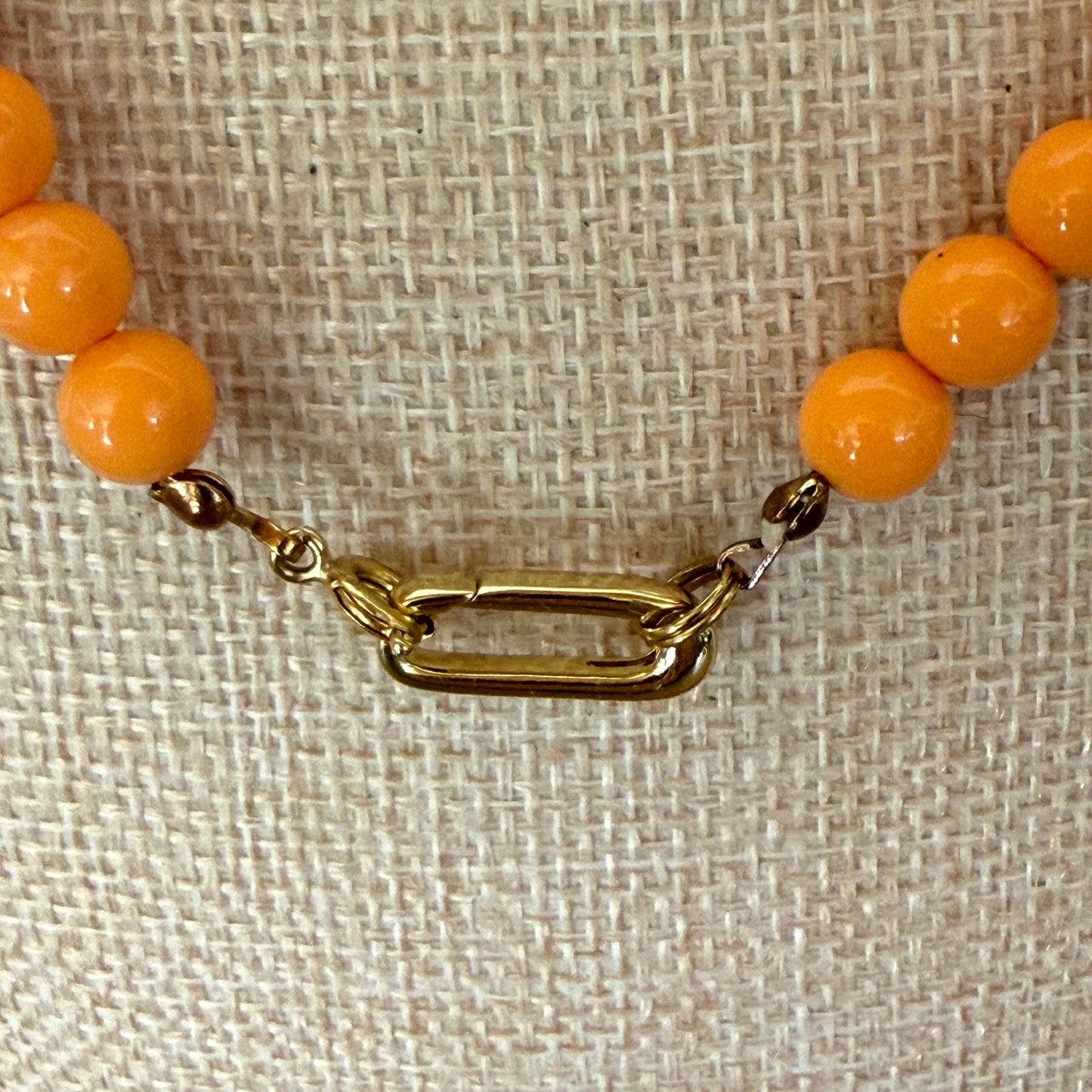 Orange/Coral Lucite with Heart Charm